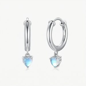 Sterling silver heart hoop earrings with a polished finish and a delicate heart-shaped drop.