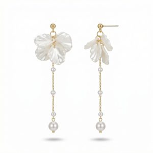 Pearl and shell drop earrings with sculpted floral petals and gold plated chain detailing.