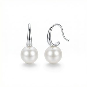 925 Sterling Silver Pearl Earrings Minimalist Jewellery 925-sterling-silver-pearl-drop-earrings 925 sterling silver pearl earrings with a minimalist hook design and smooth round pearl drops.