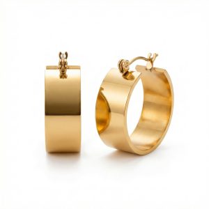 Gold plated wide hoop earrings with a smooth polished finish, designed for bold, modern everyday styling. Gold plated wide hoop earrings with a smooth curved design and polished finish. Gold Plated Wide Hoop Earrings | Polished Statement Jewellery