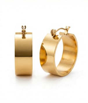 Gold plated wide hoop earrings with a smooth polished finish, designed for bold, modern everyday styling. Gold plated wide hoop earrings with a smooth curved design and polished finish. Gold Plated Wide Hoop Earrings | Polished Statement Jewellery